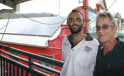 Rainbow Power Company’s Paul O’Reilly and Nimbin Neighbourhood and Information Centre chair Paul Le Bars in front of one of the six solar arrays in the village. Rainbow Power Company’s Paul O’Reilly and Nimbin Neighbourhood and Information Centre chair Paul Le Bars in front of one of the six solar arrays in the village.
